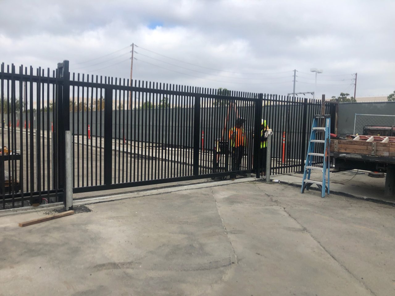 Vehicle slide gate installation