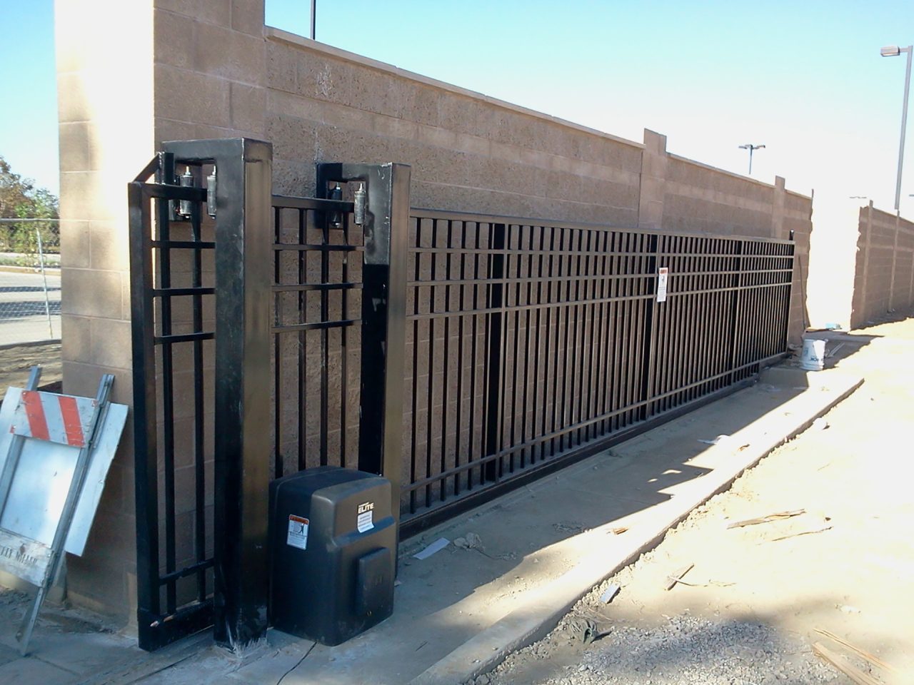 Vehicle slide gate installation
