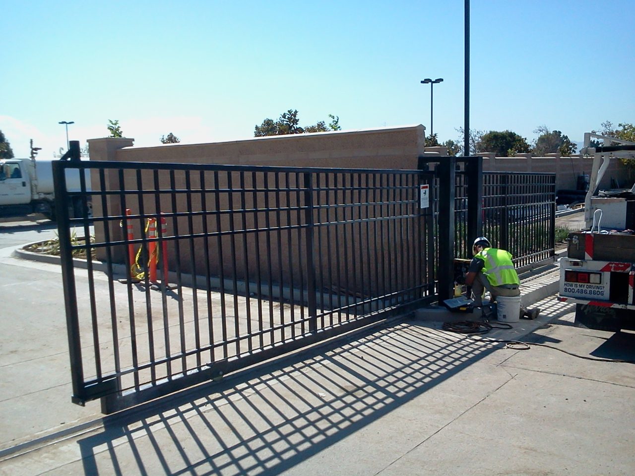 Vehicle slide gate installation