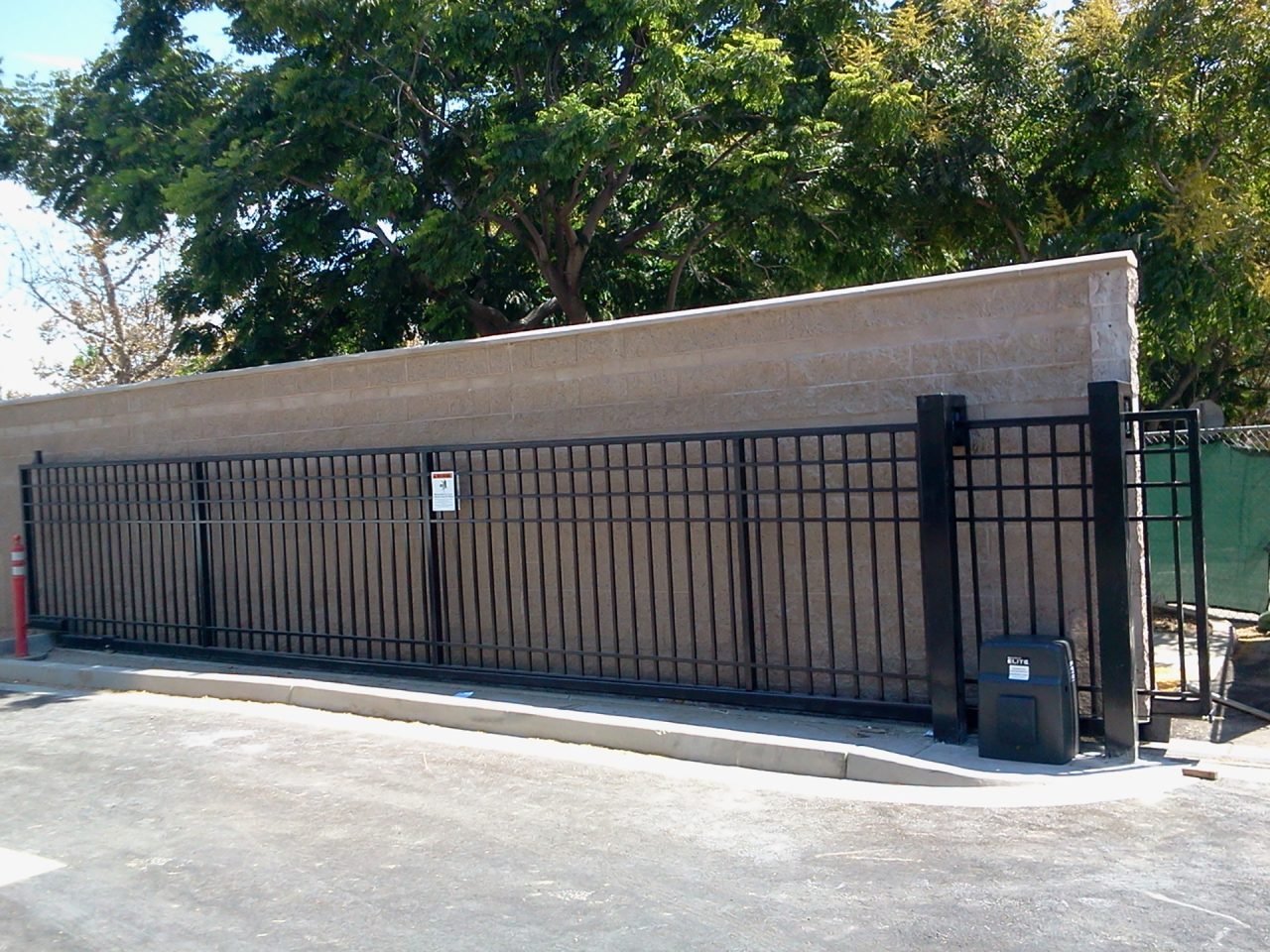Vehicle slide gate installation
