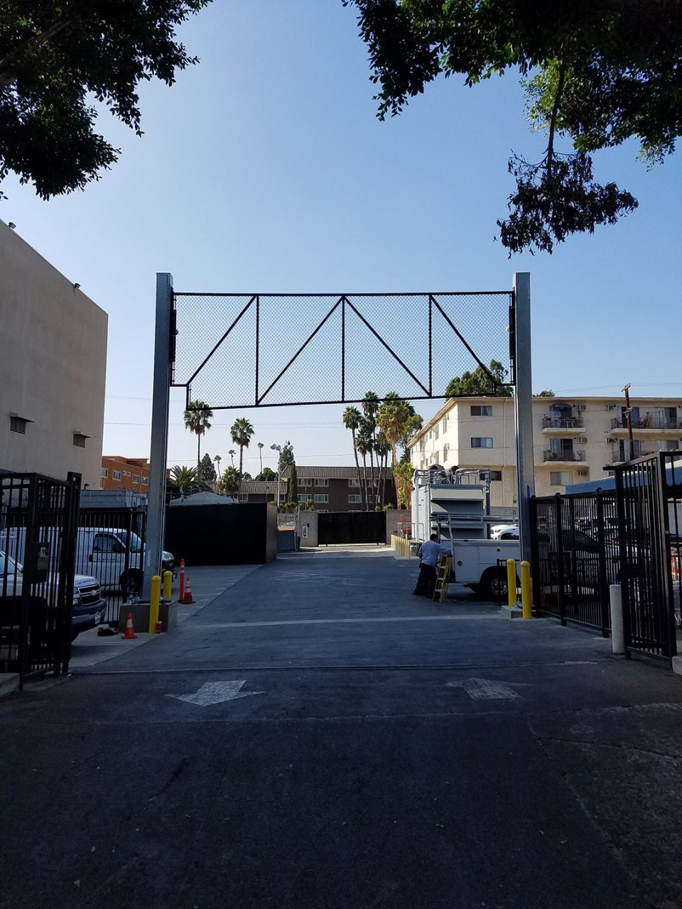 Vertical vehicle gate installation
