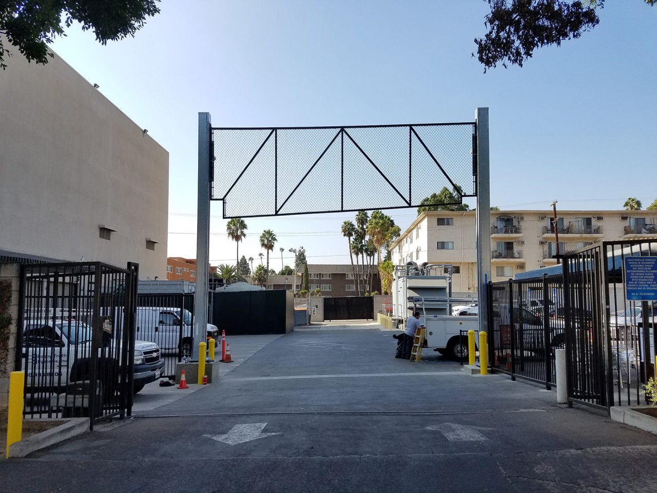 Vertical vehicle gate installation