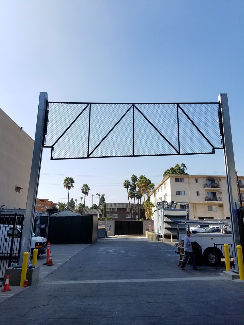 Vertical vehicle gate installation