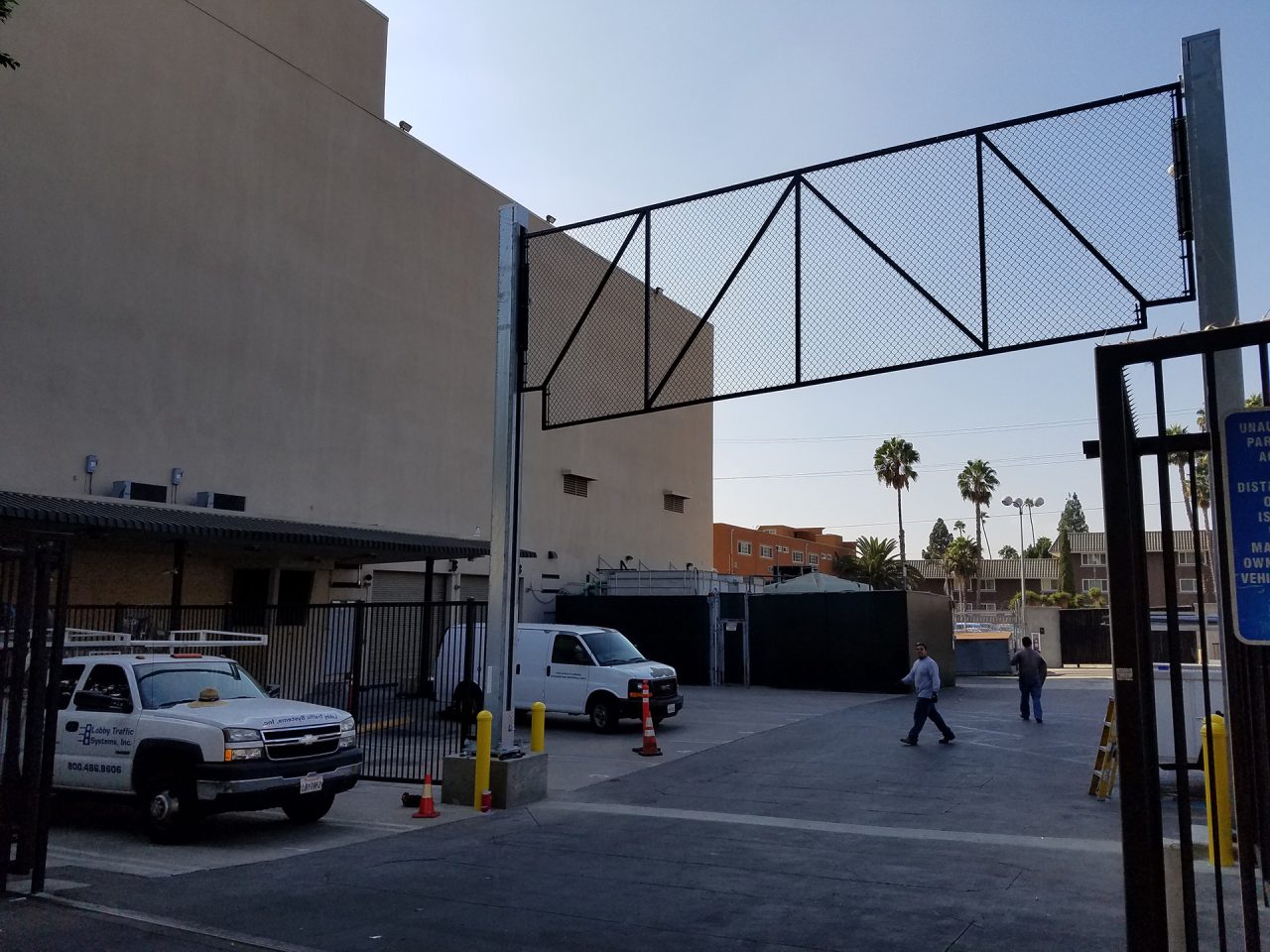 Vertical vehicle gate installation