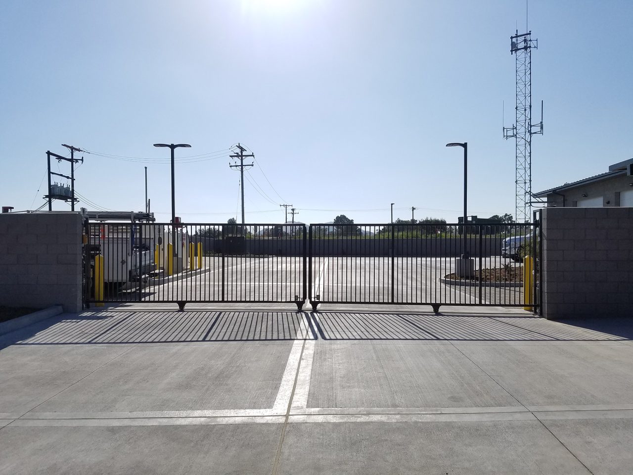 Vehicle slide gate installation