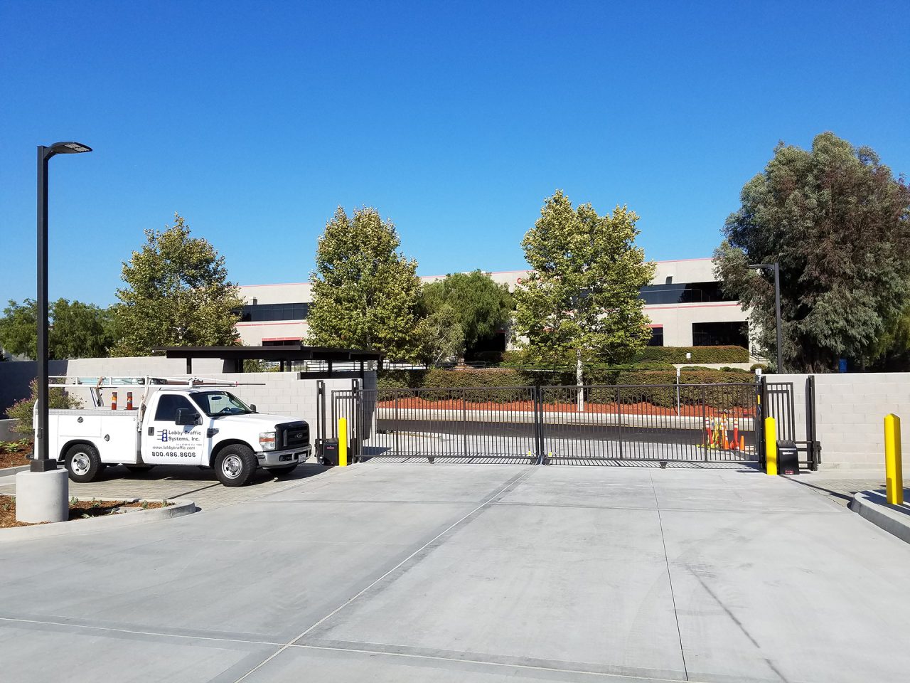 Vehicle slide gate installation