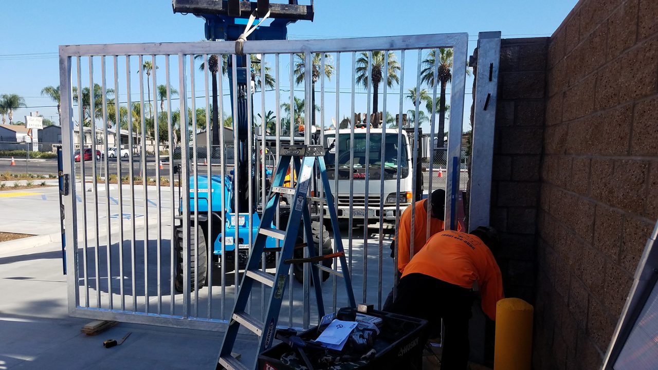 Vehicle swing gate installation