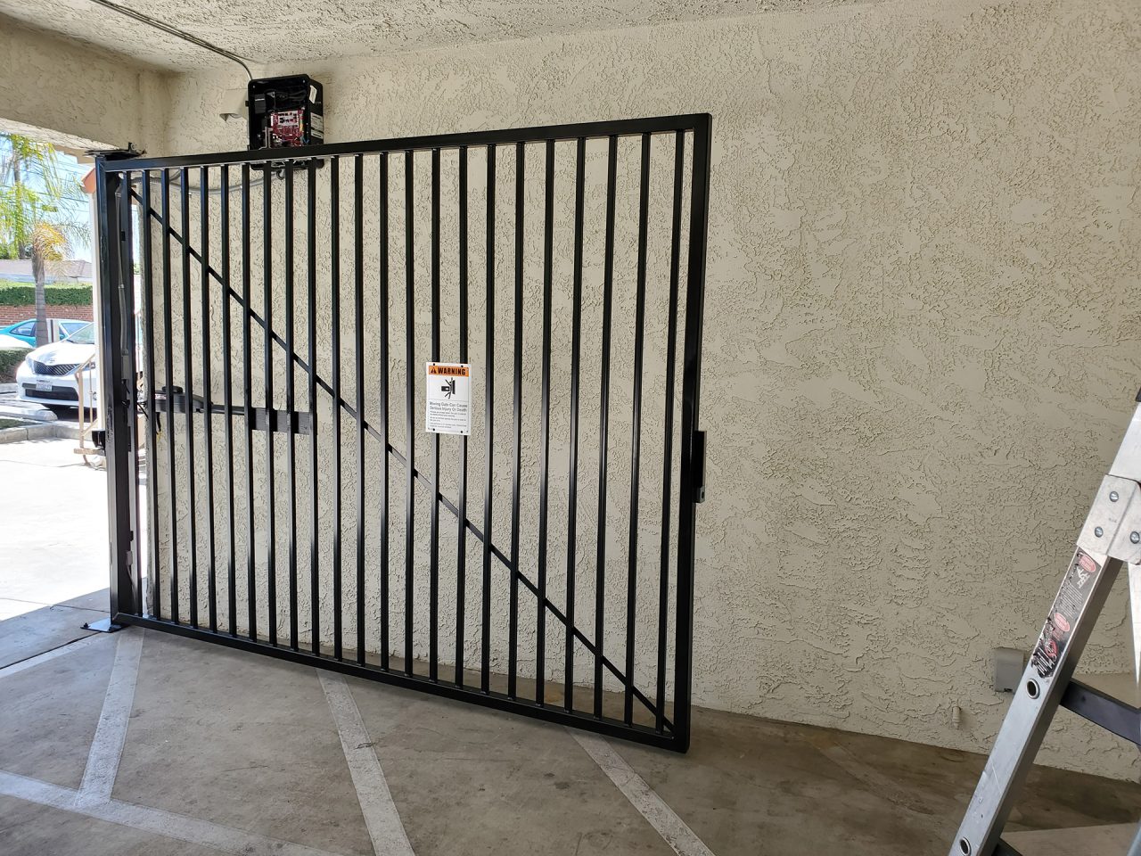 Vehicle swing gate installation