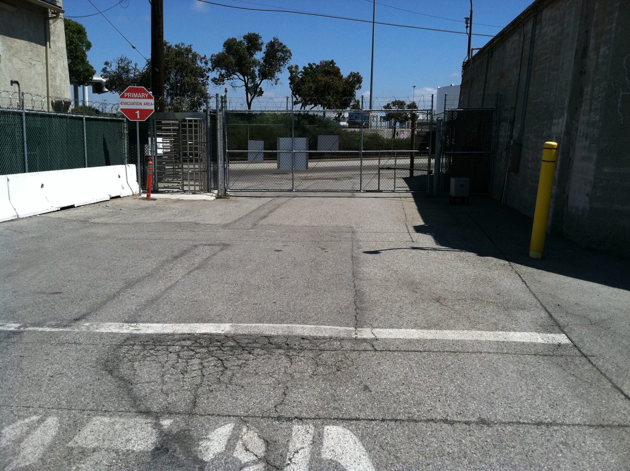 Vehicle swing gate installation