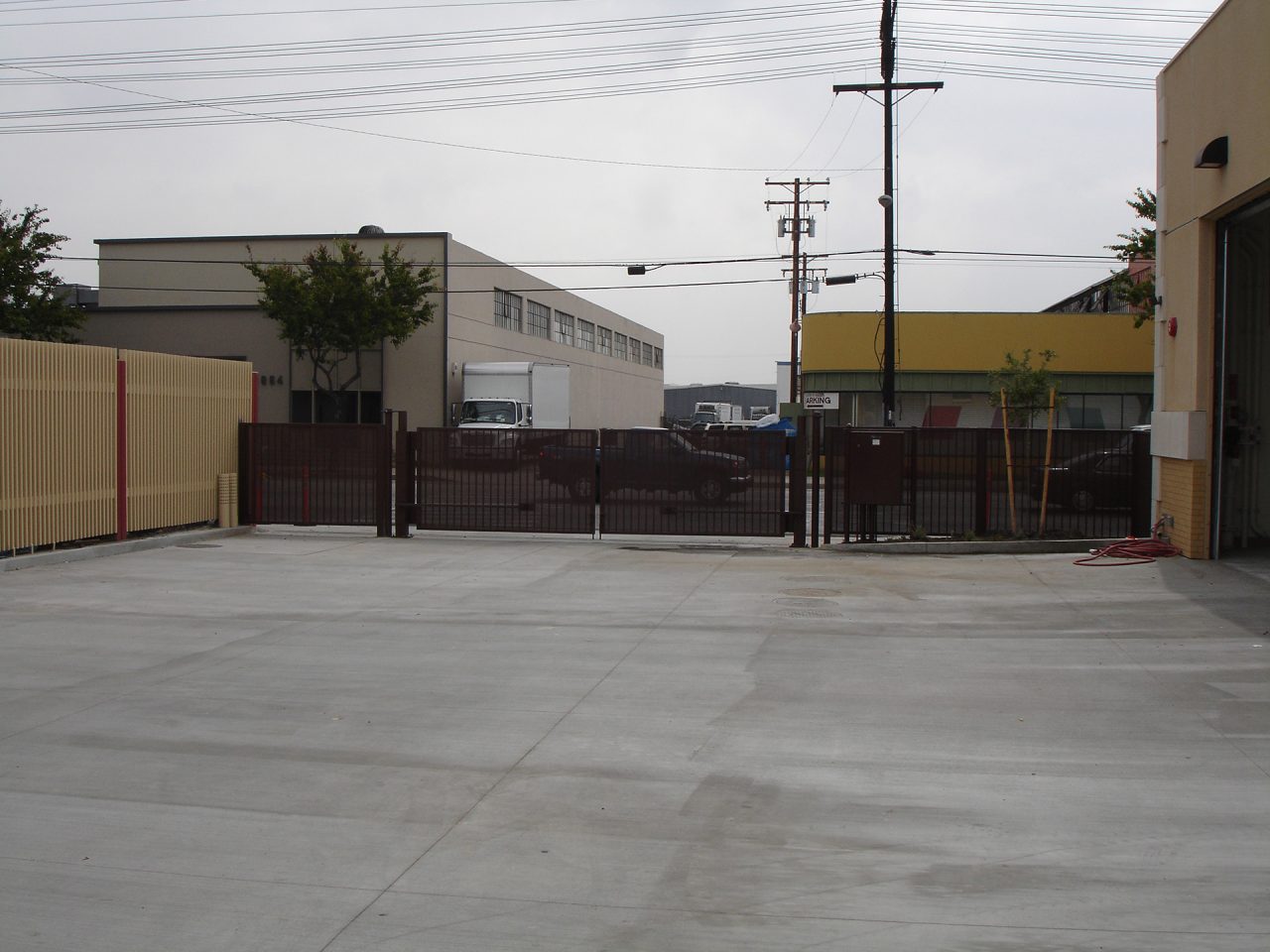 Vehicle swing gate installation