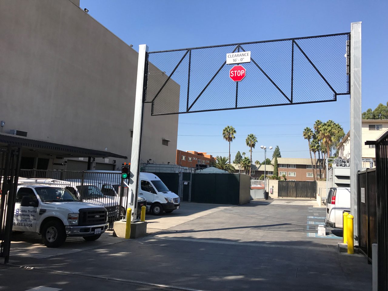 Vertical vehicle gate installation