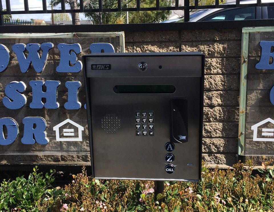 Access control keypad and intercom at a gated entrance